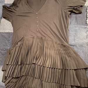 Black Top with attached pleated tiered skirt.